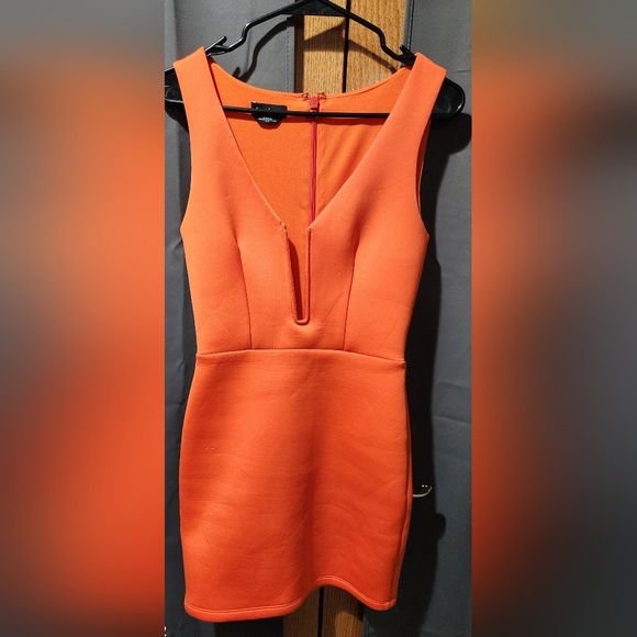 bebe Dresses & Skirts - Bebe Orange Bodycon Deep Plunge Cocktail Dress